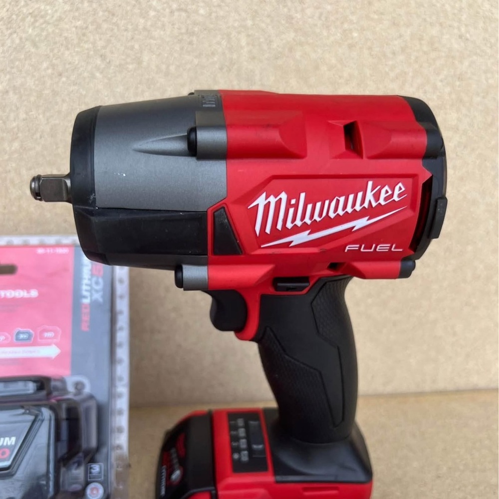 Milwaukee Red and Black Cordless Impact Wrench